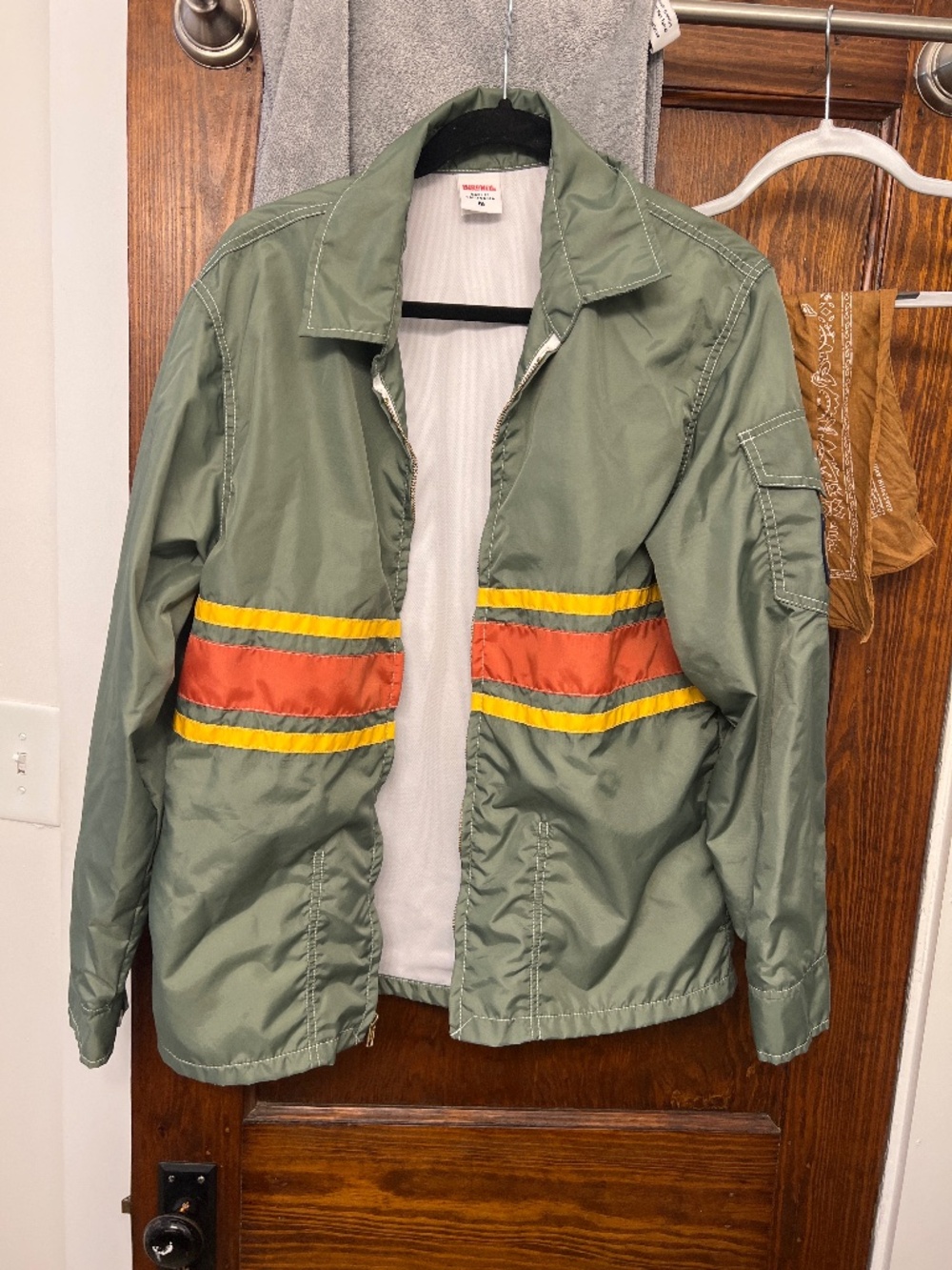 Birdwell comp surf jacket in green yellow/orange stripe nulon